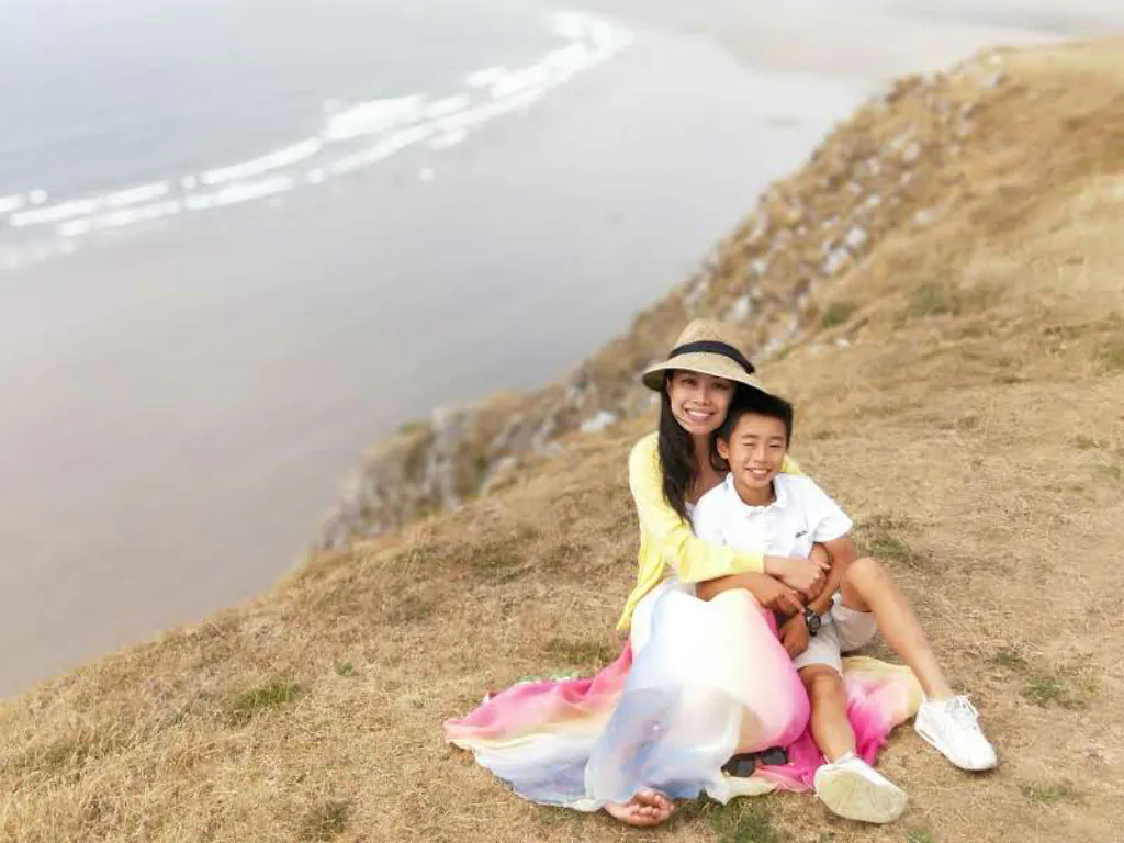 Founder Hazel Lim with her son Noah on the Welsh coast